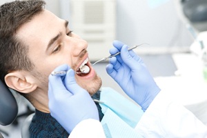 A young man in the dentist chair