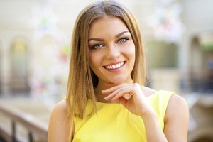 A young woman smiling
