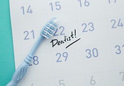 Calendar marked with a dental appointment