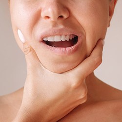 Lady’s jaw is uncomfortable