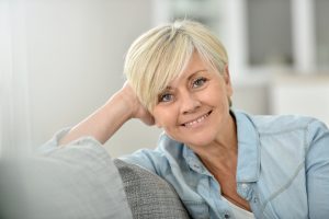 older woman smiling with nice teeth