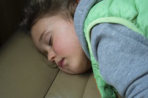 girl sleeping on face down