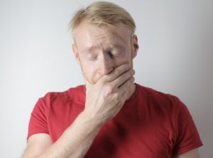 Man in pain from a dental emergency