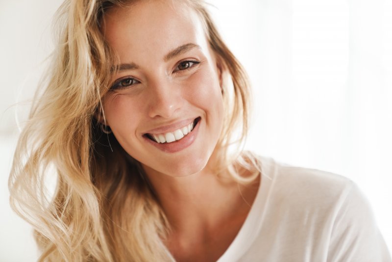 a woman showing off a beautiful smile